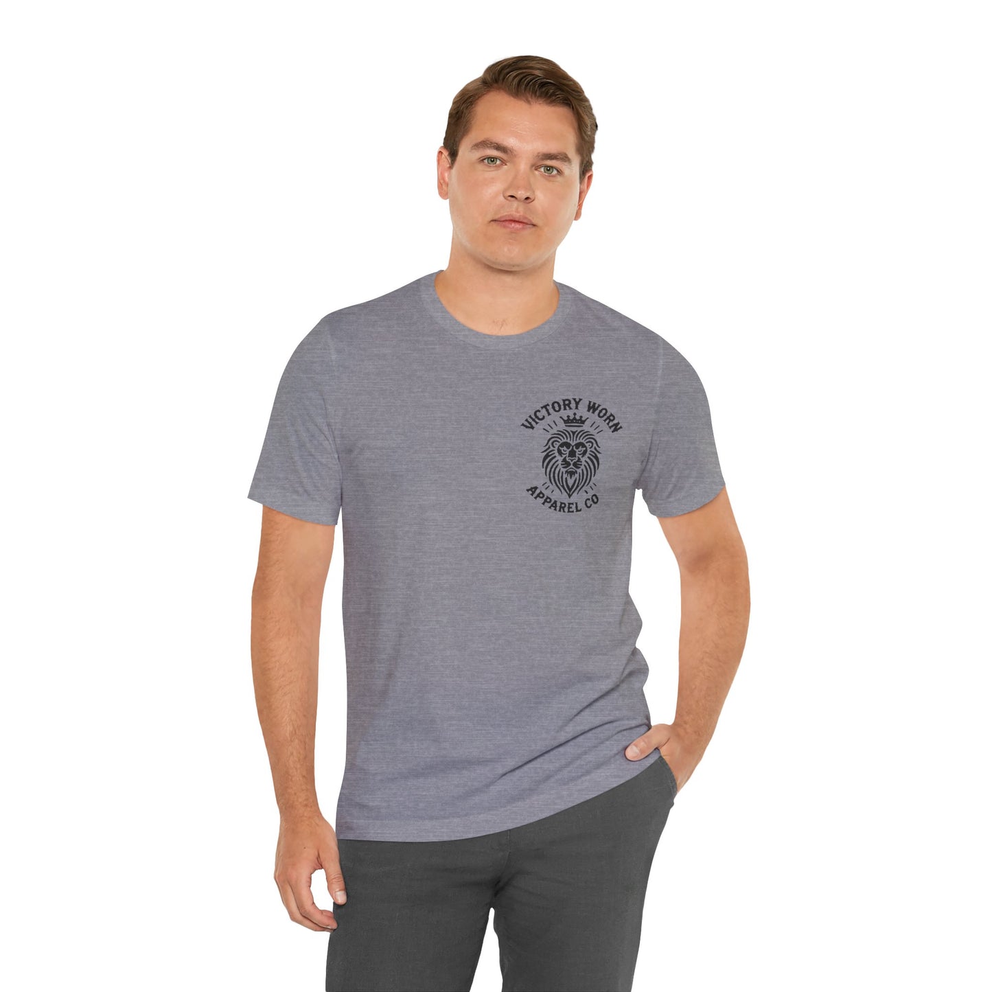 Death Defeated' T-shirt in Solid Athletic Grey, featuring the Victory Worn Apparel Co. lion logo on the front. Modeled by a woman with red hair wearing light blue jeans, looking off to the side.