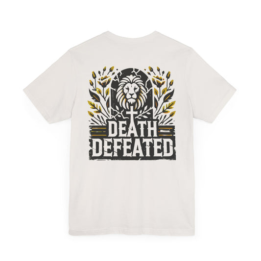 Death Defeated' T-shirt in Vintage White, featuring a bold lion graphic, cross, yellow floral accents, and the text 'Death Defeated' on the back.