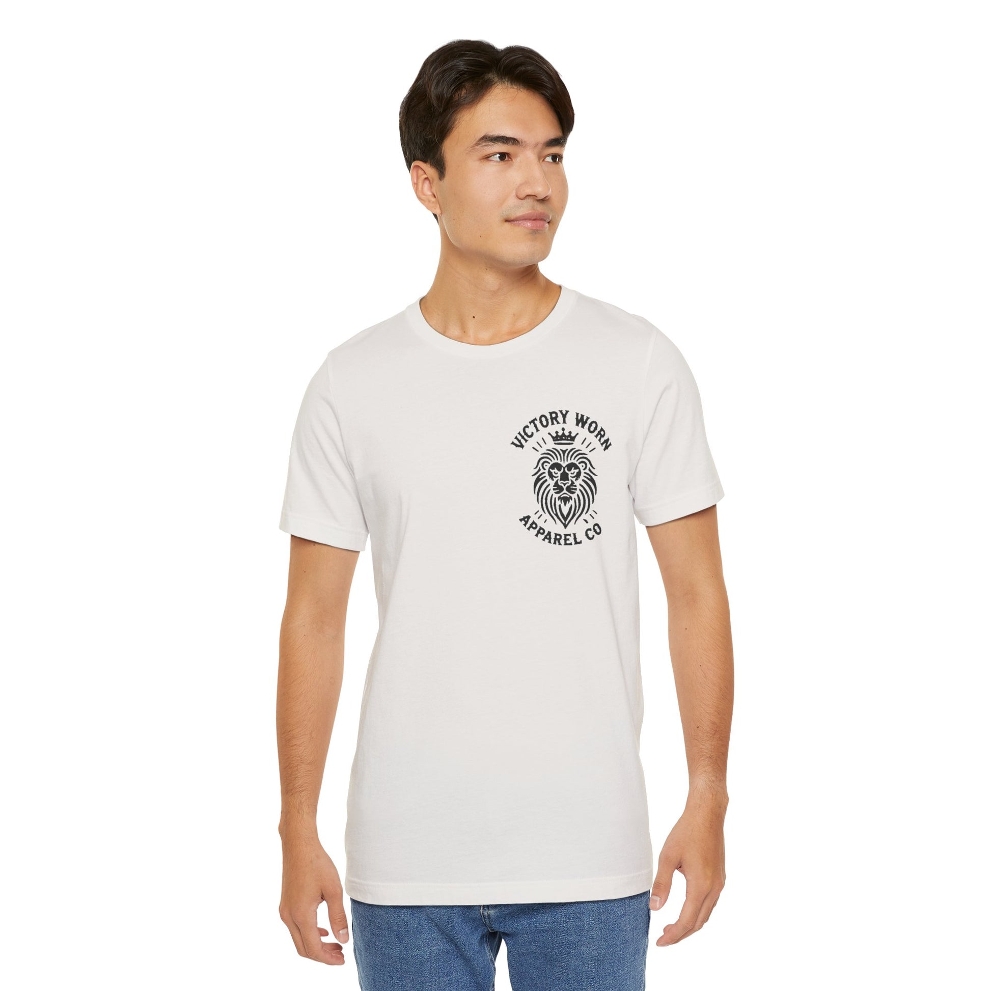 Model wearing the Victory Worn 'Death Defeated' Tee in Vintage White, featuring a bold lion and crown logo on the front chest, symbolizing faith and strength.